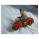 Tin Marx 3-1/2" wind-up Police motorcycle w/ key