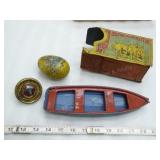 4 assorted tin toys: Circus wagon - boat - egg - t