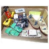 Box of 11 assorted toy vehicles: ships, trucks & c