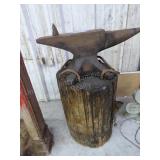 Vintage marked anvil w/ wood block