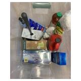 Tote, no lid, of cleaning supplies