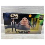 Jabba the hut and Han Solo figures