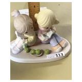 IN MY BOOK PRECIOUS MOMENTS FIGURE