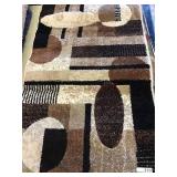 20 X 30 TAN AND BROWN THROW RUG