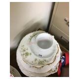 stack of various old plates/ cup and saucer