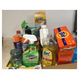lot of cleaning supplies and laundry supplies