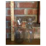 2 Old Polk milk bottles