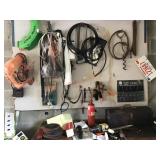 Tools hanging on wall and tool box on top of work
