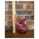 Cranberry glass pitcher