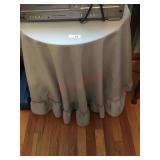 Round decorator table with cloth