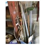 Bucket of pipe and various tools