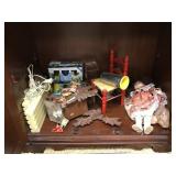 Clock/ candles/ toy chair and misc. in cabinet