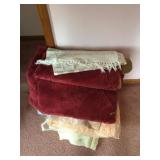 Stack of throw rugs