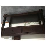 Dark finish television stand with drawers