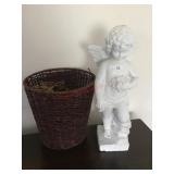 Cherub statue and wicker basket