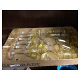 18 Pcs. Yellow stemmed glasses and shot glasses