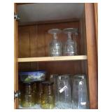 Amber drinking glasses and all glass in cabinet