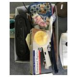 Box lot with radio/ cutting board/ magnifier/