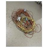 Lot of wires, cables, lights extension cords