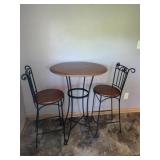 Pub table and two chairs