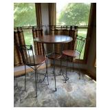 Pub table and two chairs