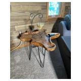 Metal and wood table with candle holder