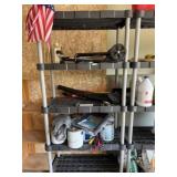 Rubbermaid plastic shelving unit with contents