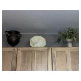 Decoratives above cabinet in kitchen