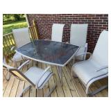 Glass top patio table and 6 chairs