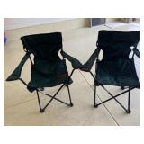 2 green folding chairs
