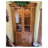 Oak lighted corner cabinet