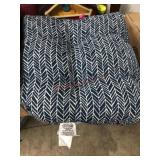 Two blue and white cushions