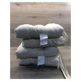 4 white chair cushions