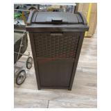 Suncast outdoor trash can. Not assembled loosely