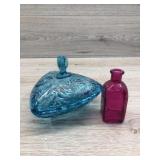 Glass candy dish and pink bottle