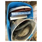 A box of plastic serving trays, baking pan, and