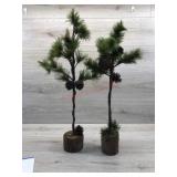 2 fake pine trees