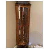 Glass front curios cabinet.  60" tall