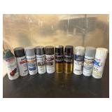 10 various spray cans. Some partially used