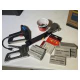 Lot of staplers with staples