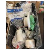 Box of various plumbing supplies