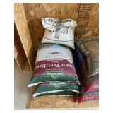 3 bags weed and feed fertilizer and partial bag