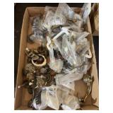Box of various door knobs handels