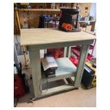 40x30x43 tall rolling table contents not included
