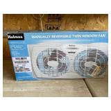 Holmes manually reversible twin window fan