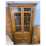Solid oak leaded glass corner curio cabinet