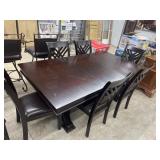 New dinning room table 6 chairs and 1 leaf