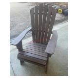 Brown Adirondack chair has some damage