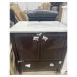 Damaged 30" vanity base with sink, base is good,