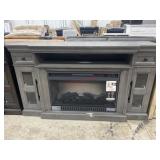 Damaged Quantim Flame media cabinet with fire